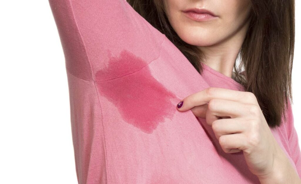 Causas da hiperidrose - fatores hormonais e estresse como gatilhos do suor excessivo